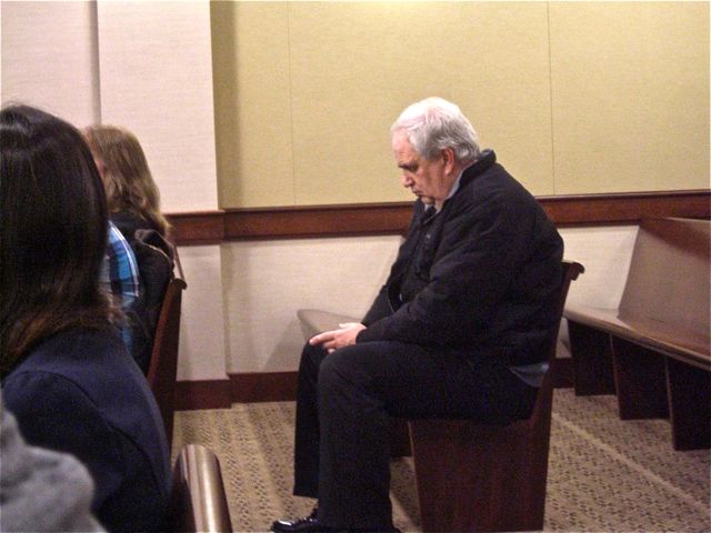 Township Treasurer Ron Edwards waits in th District Court in December