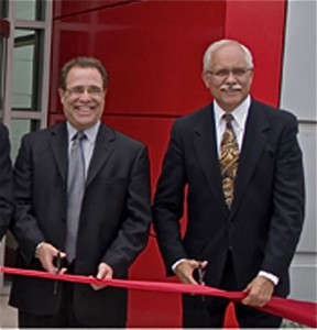 Robert Ficano and Plymouth Township Supervisor Richard Reaume at ribbon cutting for new Robert Bosch facility