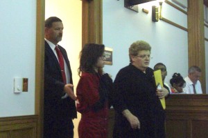 Sikorski (c) escorted into court following her attorney-35th District Court-Plymouth