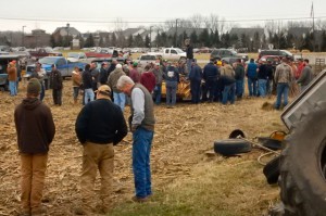 Farmers from across the state get ready to bid on the equipment and farm implements during the auction last week at one of the last farms in Northville.